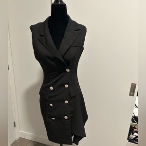 Unique black blazer dress. Fashionable and chic. Size small.
